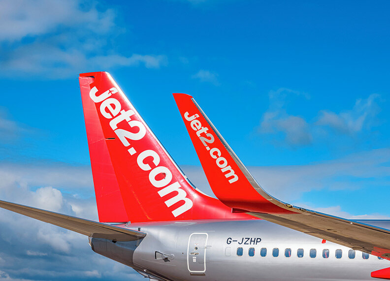 Jet2.com aircraft tails at a UK airport
